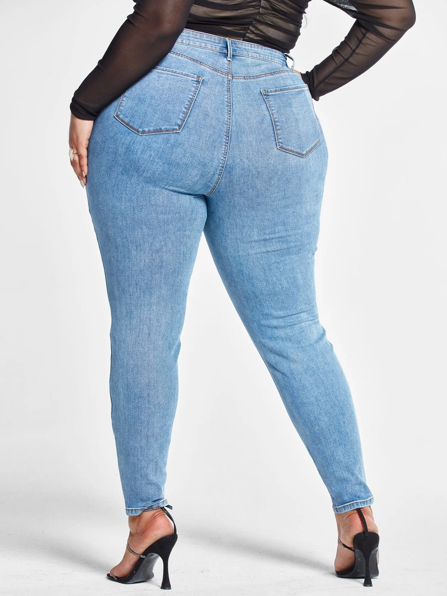 High Rise Destructed Skinny Jeans in Light Indigo