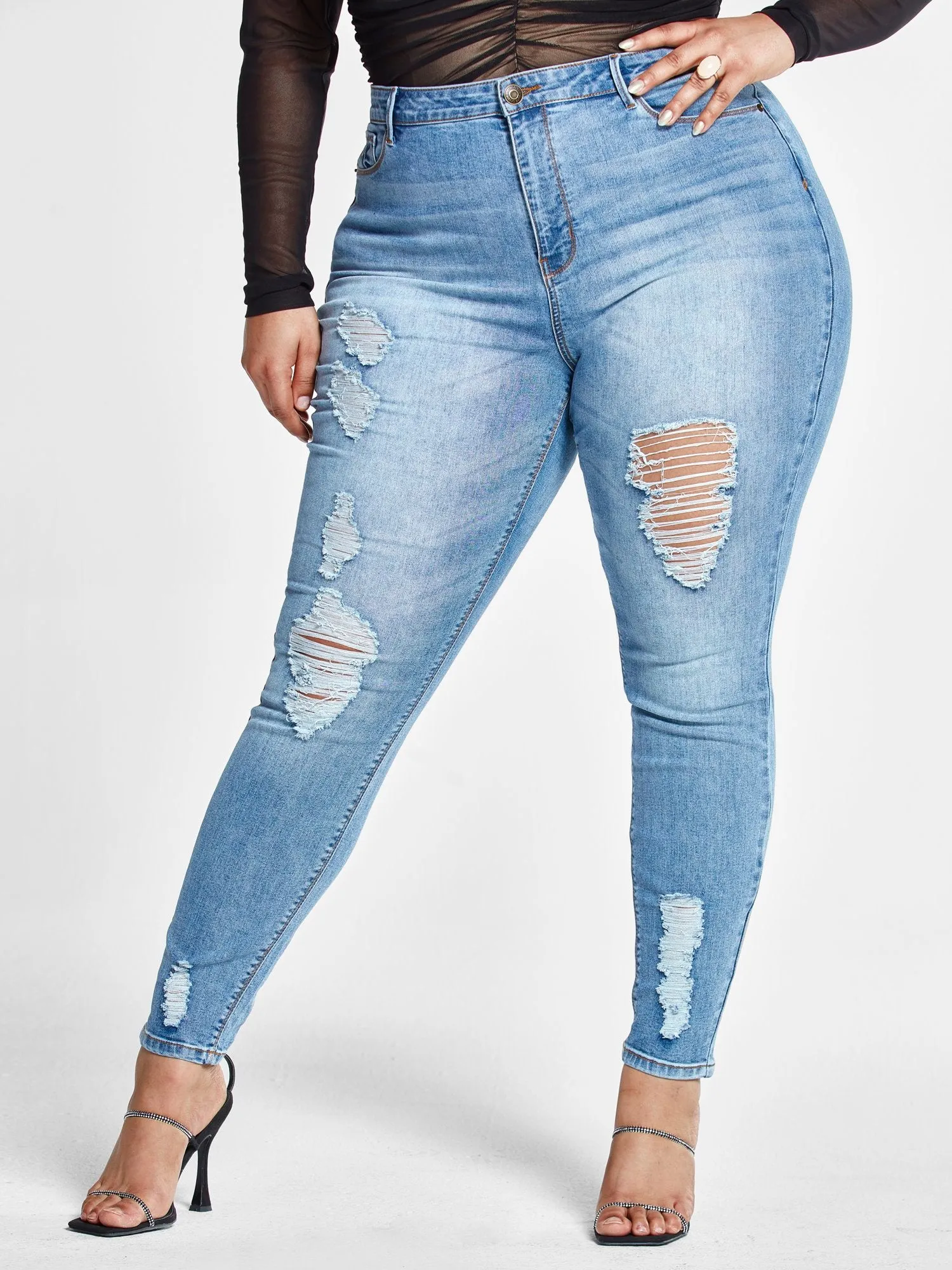 High Rise Destructed Skinny Jeans in Light Indigo