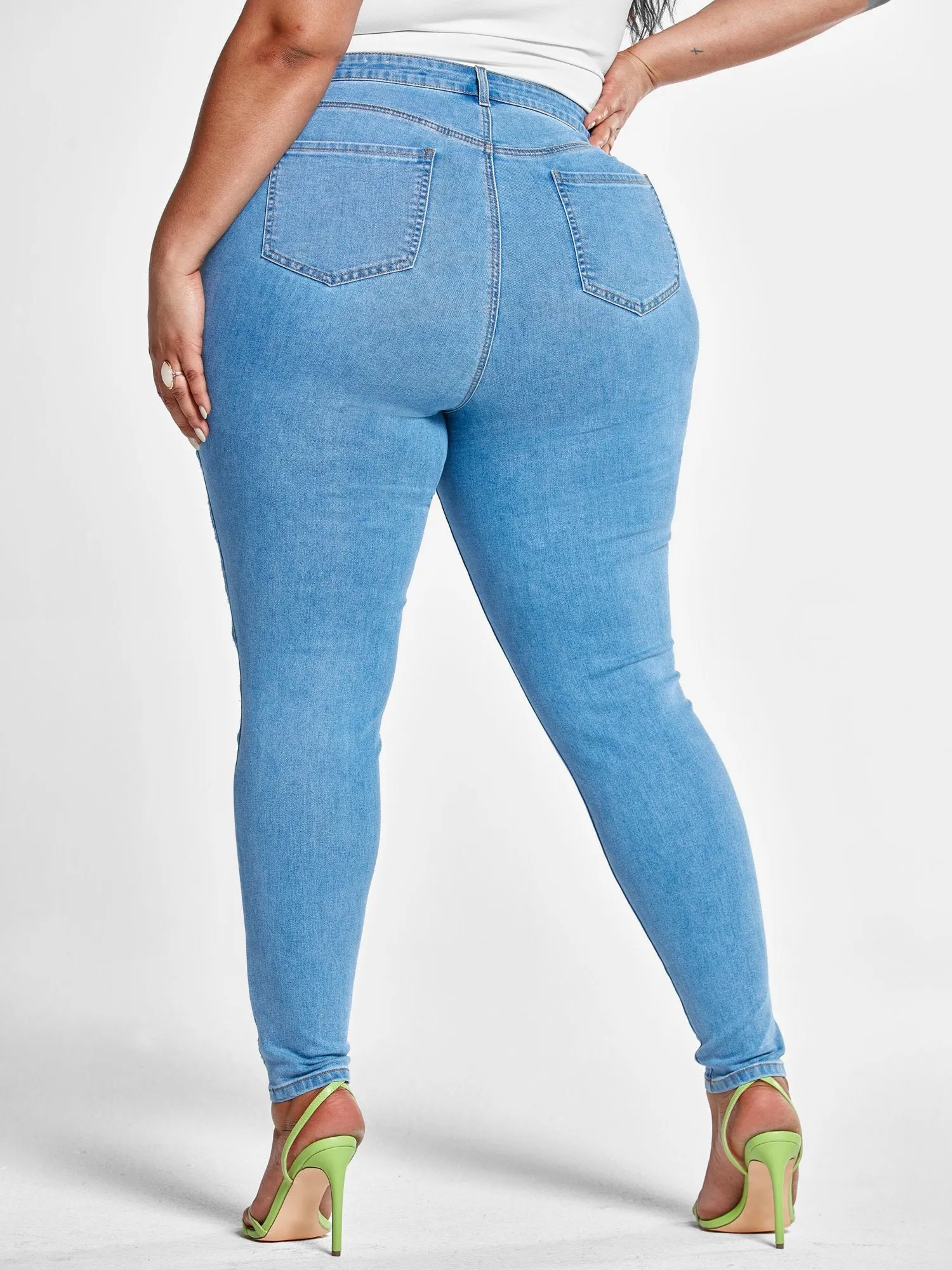 High Rise Skinny Jeans with Cutouts