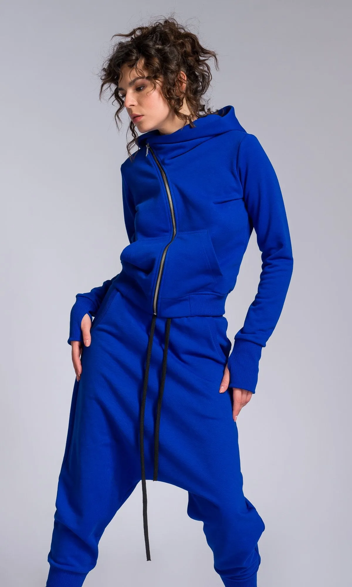 Two-piece Set of Deep Drop Crotch Pants and Asymmetric Short Hoodie