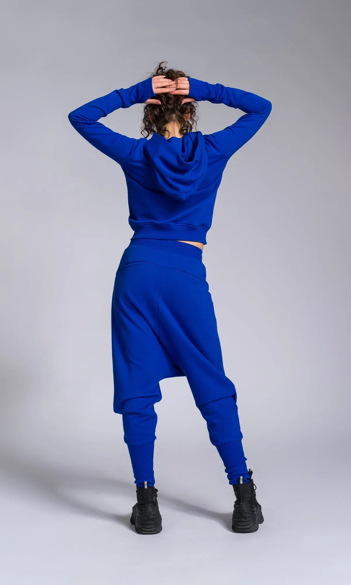 Two-piece Set of Deep Drop Crotch Pants and Asymmetric Short Hoodie